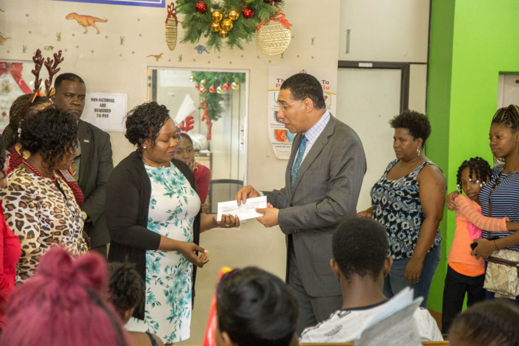 PM Holness Donates $1-Million to the Bustamante Hospital for Children