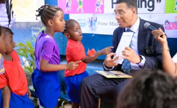 Ribbon Cutting at the Opening of Technology Room And Read Across Jamaica Day