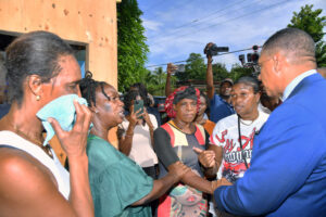 Prime Minister Holness Visits Grieving Families in Commodore, Linstead, St. Catherine