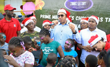 Prime Minister Holness Takes Christmas Treats to Hurricane-Affected Communities in Western Jamaica
